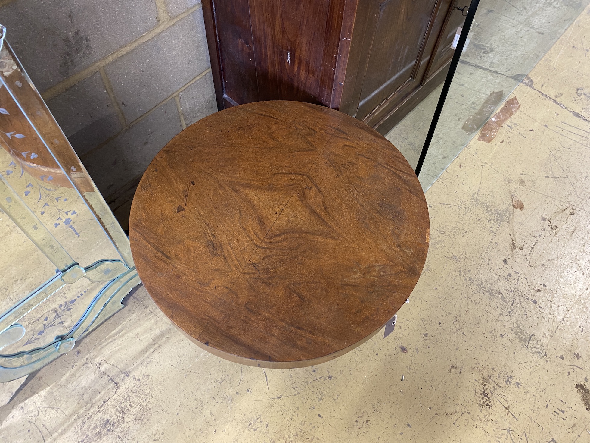 An Art Deco style circular walnut low table, diameter 62cm, height 44cm